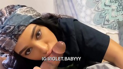 little Violet having fun blowing enormous spear